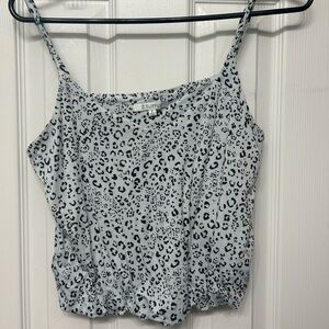 cheetah print z supply cropped cami with ruffle detail along the bottom trim